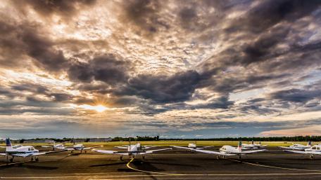 Airplanes Under Dramatic Skies For 4K Wallpaper wallpaper