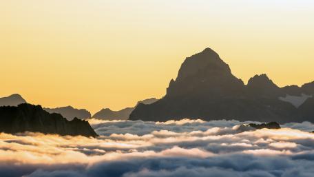 Majestic Mountains Above the Clouds wallpaper