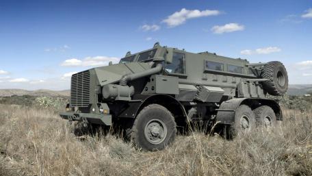 Heavy Military Vehicle in a Natural Setting wallpaper