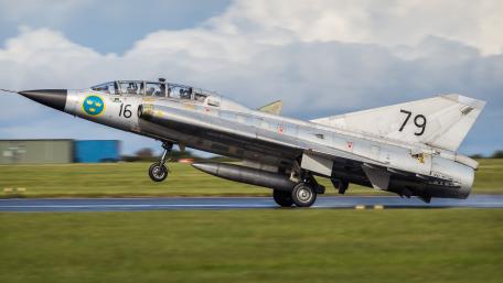 Sleek Military Aircraft Taking Off in Stunning Detail wallpaper