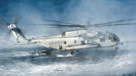 Helicopter Mastery Over the Waves wallpaper