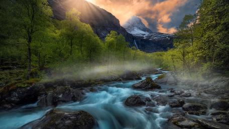 Sunset Over Mountain River Valley wallpaper