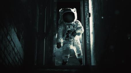 Mysterious Astronaut in Shadows wallpaper