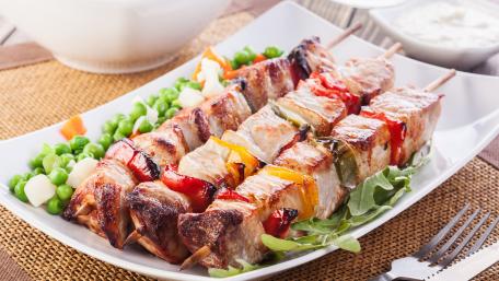 Delicious Grilled Skewers with Colorful Vegetables and Meat wallpaper