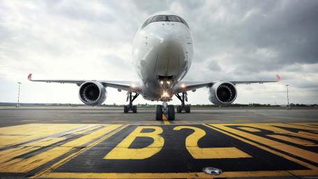 Airplane on the Runway in Stunning Clarity wallpaper