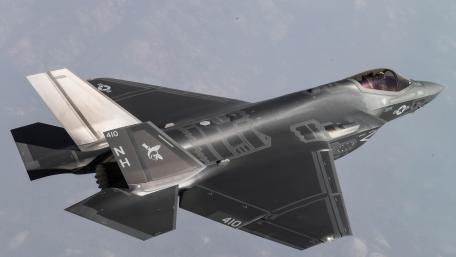Futuristic Fighter Jet in Flight wallpaper
