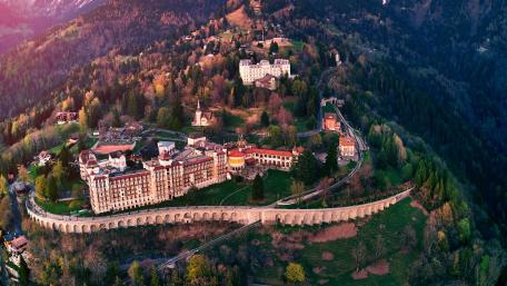 Aerial View of Majestic Castle Overlooking Scenic Landscape wallpaper