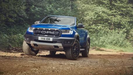 Ford Pickup Adventure in Lush Forest Landscape wallpaper