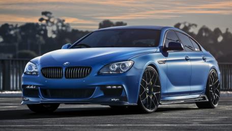 Sleek Dream Car in Striking Blue Finish wallpaper