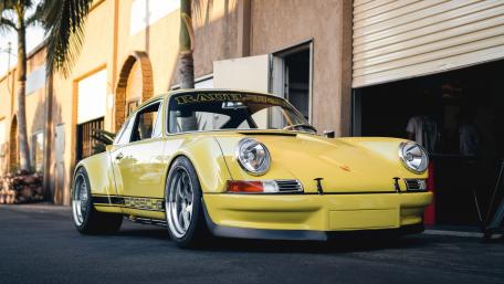 Vintage Yellow Porsche Sports Car Wallpaper wallpaper