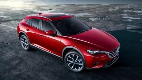 Sleek Mazda in Vibrant Red Finish wallpaper