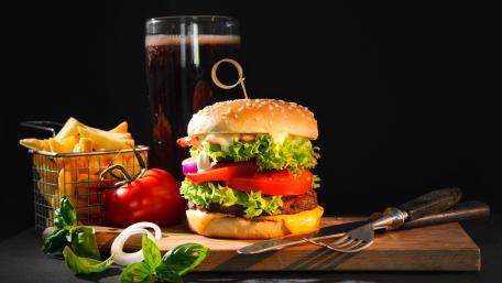 Delicious Hamburger and Fries on Display wallpaper