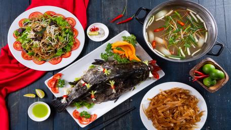 Exquisite Fish Dishes Displayed Beautifully wallpaper