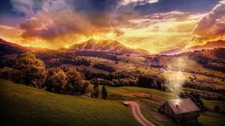 Serene Highland Cottage at Sunset Glow wallpaper