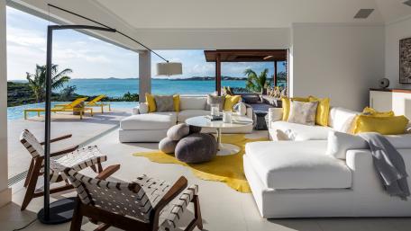 Elegant Coastal Living Room with Stunning Views of the Ocean wallpaper