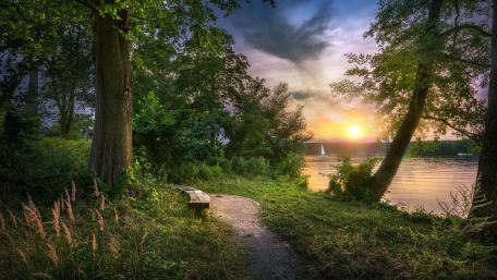 Serene Lakeside Escape with Bench and Sunset View wallpaper