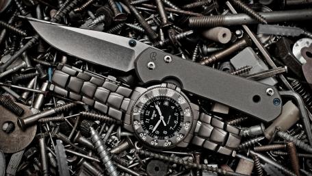 Precision and Steel: Military Gear Displayed wallpaper