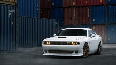 Sleek White Dodge Challenger in Urban Setting wallpaper