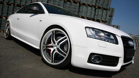 Sleek Audi Sports Car in Stunning White Finish wallpaper