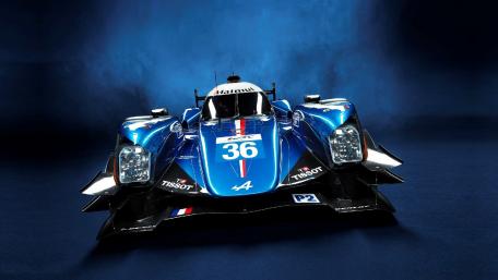 Dynamic Blue Race Car in Action wallpaper