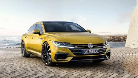 Sleek Volkswagen Car by the Shoreline wallpaper