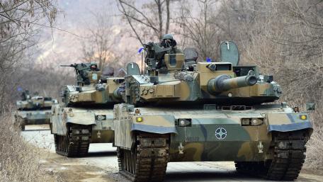 Modern Tanks in Formation wallpaper