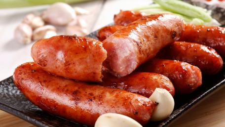 Sizzling Sausages on a Plate wallpaper