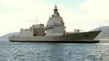 Mighty Warship on Tranquil Waters wallpaper