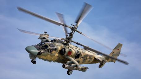 Dynamic Military Helicopter in Action wallpaper