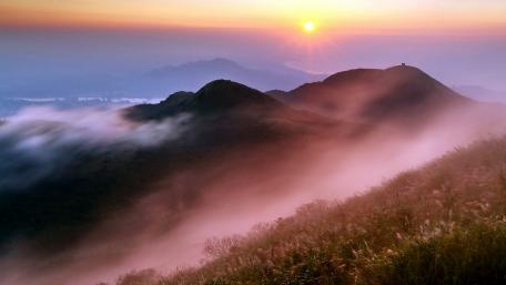 Serenity in Mountain Mist at Sunrise wallpaper