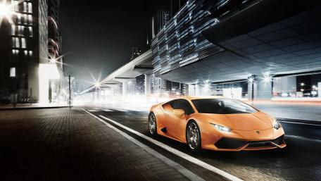 Sleek Lamborghinis in Urban Nightscape wallpaper