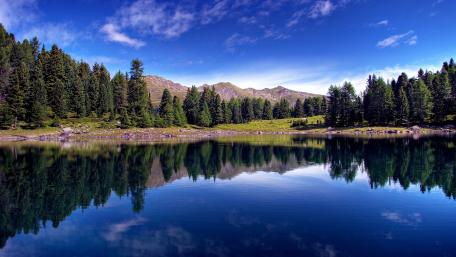 Serene Reflections in a Mountain Lake wallpaper