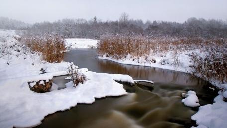 Serene Winter River Landscape in Snowy Bliss wallpaper