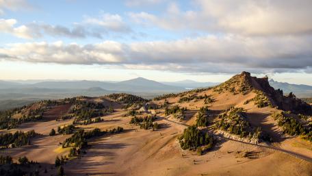 Stunning Desert Landscape with Majestic Dunes and Mountains wallpaper