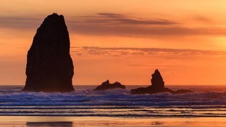 Haystack Rock in the sunset wallpaper