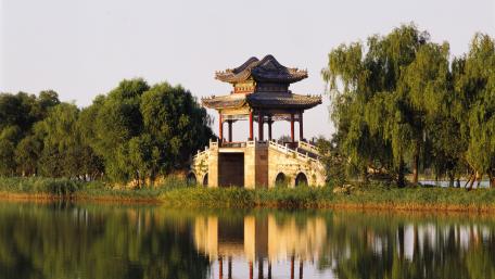 Serene Pagoda Reflected in Tranquil Waters wallpaper
