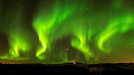 Dancing Green Aurora Over Night Landscape wallpaper
