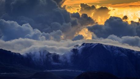 Majestic Mountain Landscape Under Dramatic Clouds wallpaper