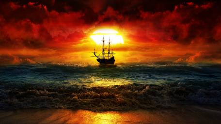 Fiery Sunset Voyage Across the Seas wallpaper