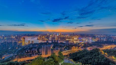 Stunning Cityscape at Dusk Overlooking Skyline and River Lights wallpaper