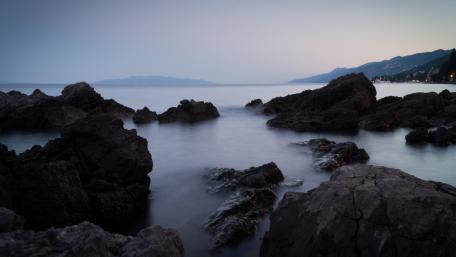 Serene Twilight at the Rocky Coastline wallpaper