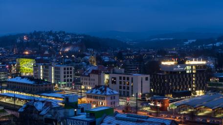 City at Dusk Illuminated by Evening Lights wallpaper
