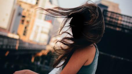 Girl looking at the city wallpaper
