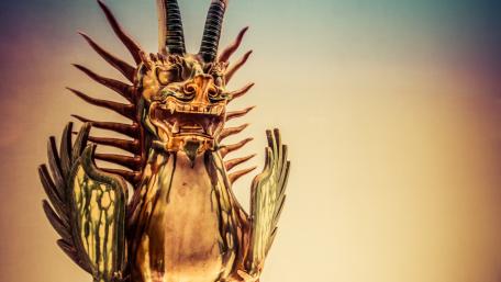 Majestic Golden Dragon Figure in Fantasy World wallpaper