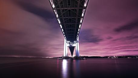 Majestic Nightscape beneath the Bridge's Glow wallpaper