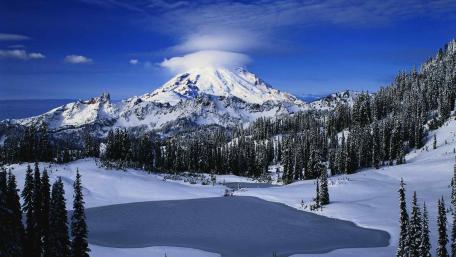 Majestic Winter Landscape of Mountains and Frozen Lake wallpaper