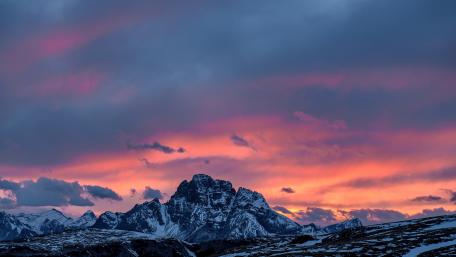 Pink Skyline Over Majestic Alpine Peaks wallpaper