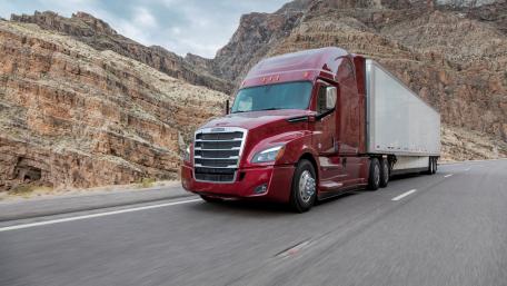 Majestic Trailer Truck on Mountain Road wallpaper
