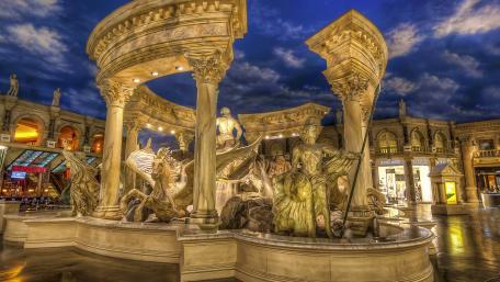 Majestic Fountain in Urban Splendor wallpaper