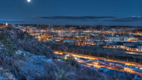 City Lights Under the Moonlit Sky wallpaper